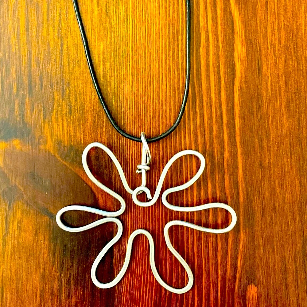 Unique custom necklace purchased at art show in silver